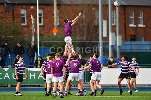 Clongowes' Matthew Roche Nagle rises high at the lineout.