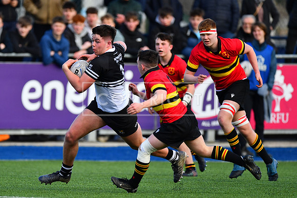 Newbridge College tighthead prop Billy Bohan on the attack in the first half.