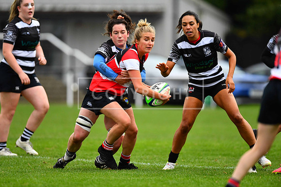 Hannah Rose Buckley is tackled by Katelyn Flemming