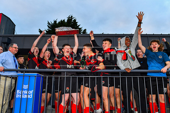 Kildare Town CS celebrate with the Leinster Rugby Senior Development trophy.