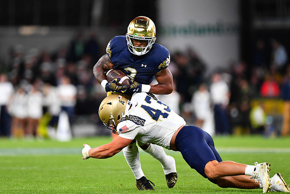 Gi'Bran Payne tackled by Kyle Jacob.