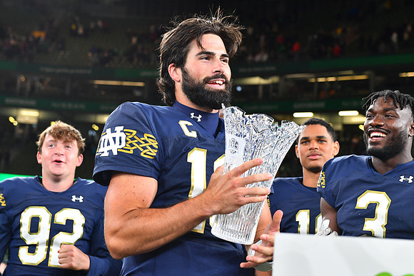 Sam Hartman with the trophy.