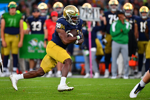Jadarian Price en route to a touchdown.