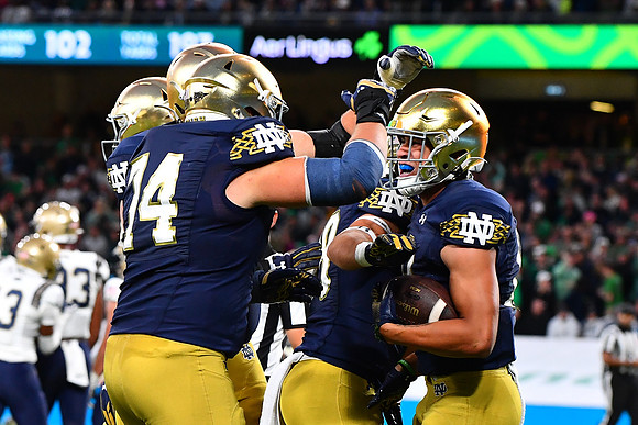 Billy Schrauth celebrates with Jayden Greathouse.