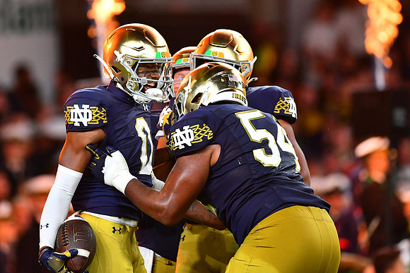 Delon Colzie congratulated by Blake Fisher.