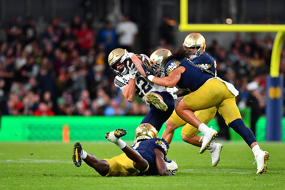 Eli Heidenreich tackled by Marist Liufau.