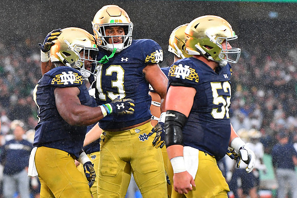 Holden Staes celebrates with Audric Estime.