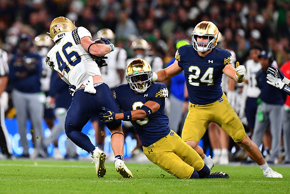 Xavier Watts tackles Alex Tecza