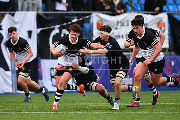 Newbridge College right winger Rory Allen on the attack.